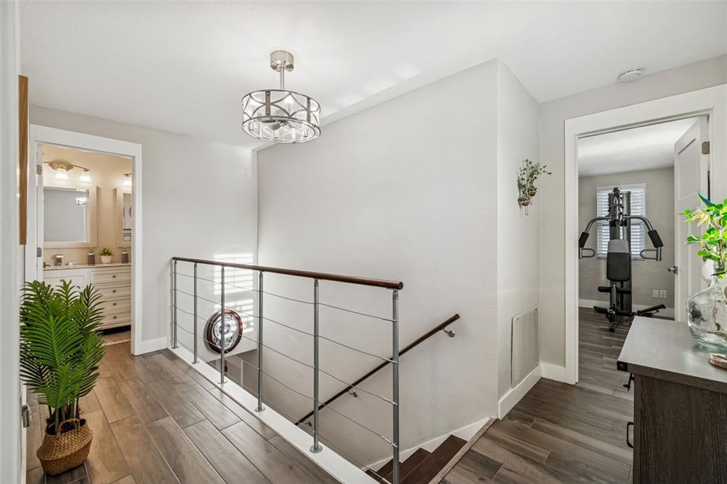 5809 Rio Drive New Port Richey, FL 34652 - Photo 30 of 61 a view of an entryway with wooden floor