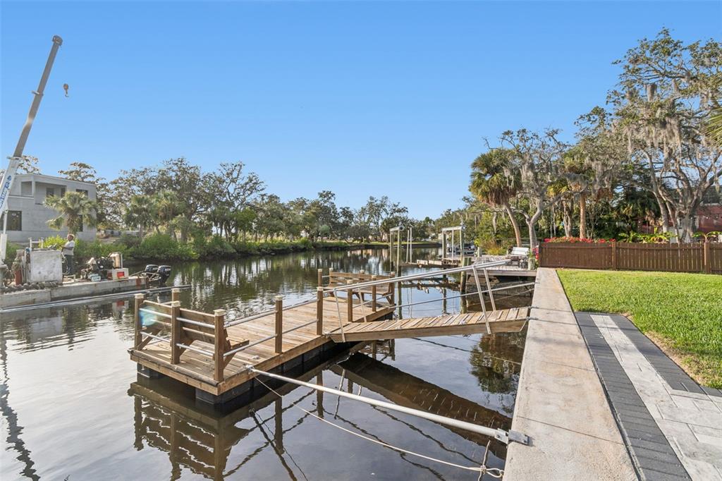 5809 Rio Drive New Port Richey, FL 34652 - Photo 37 of 61 a view of a lake with chairs