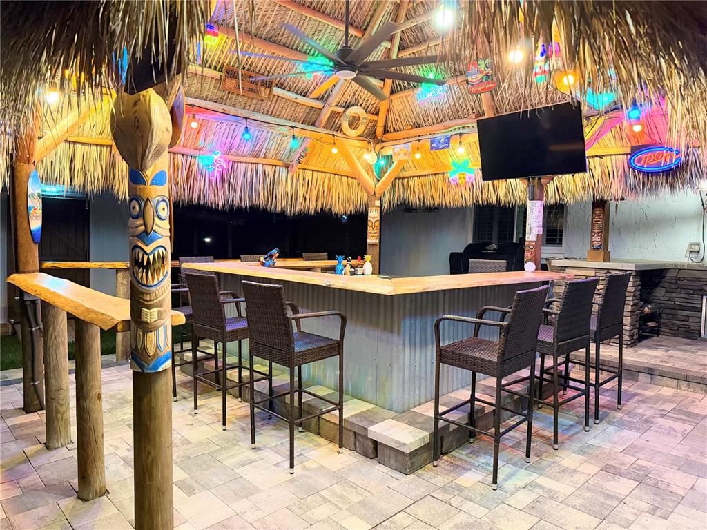 5809 Rio Drive New Port Richey, FL 34652 - Photo 5 of 61 a view of a chairs and table in a patio