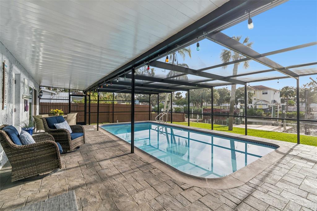 5809 Rio Drive New Port Richey, FL 34652 - Photo 53 of 61 a view of swimming pool with seating area and furniture