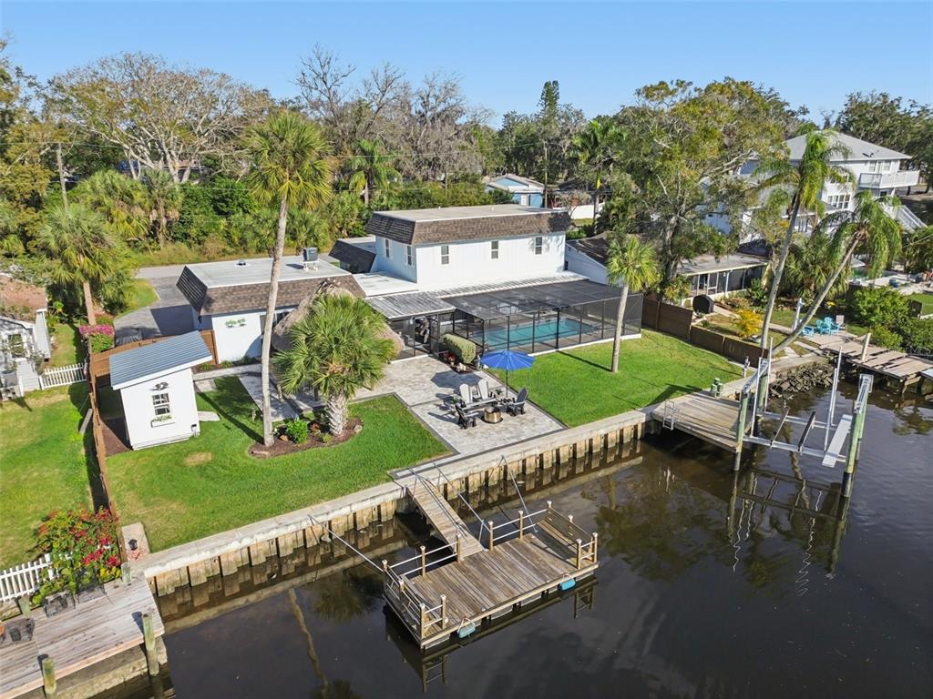 5809 Rio Drive New Port Richey, FL 34652 - Photo 57 of 61 an aerial view of a house with garden space and street view