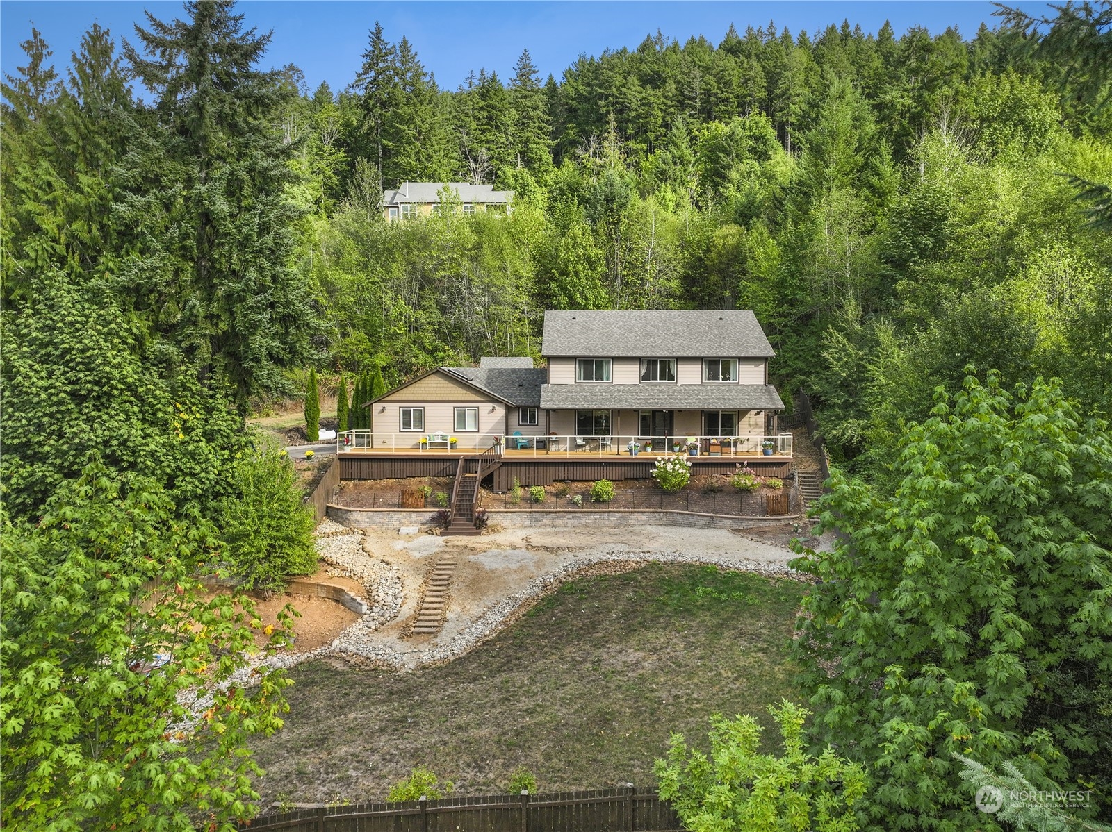1124 Summit Lake Shore Road Northwest Olympia, WA 98502 - Photo 2 of 40 an aerial view of a house with a yard