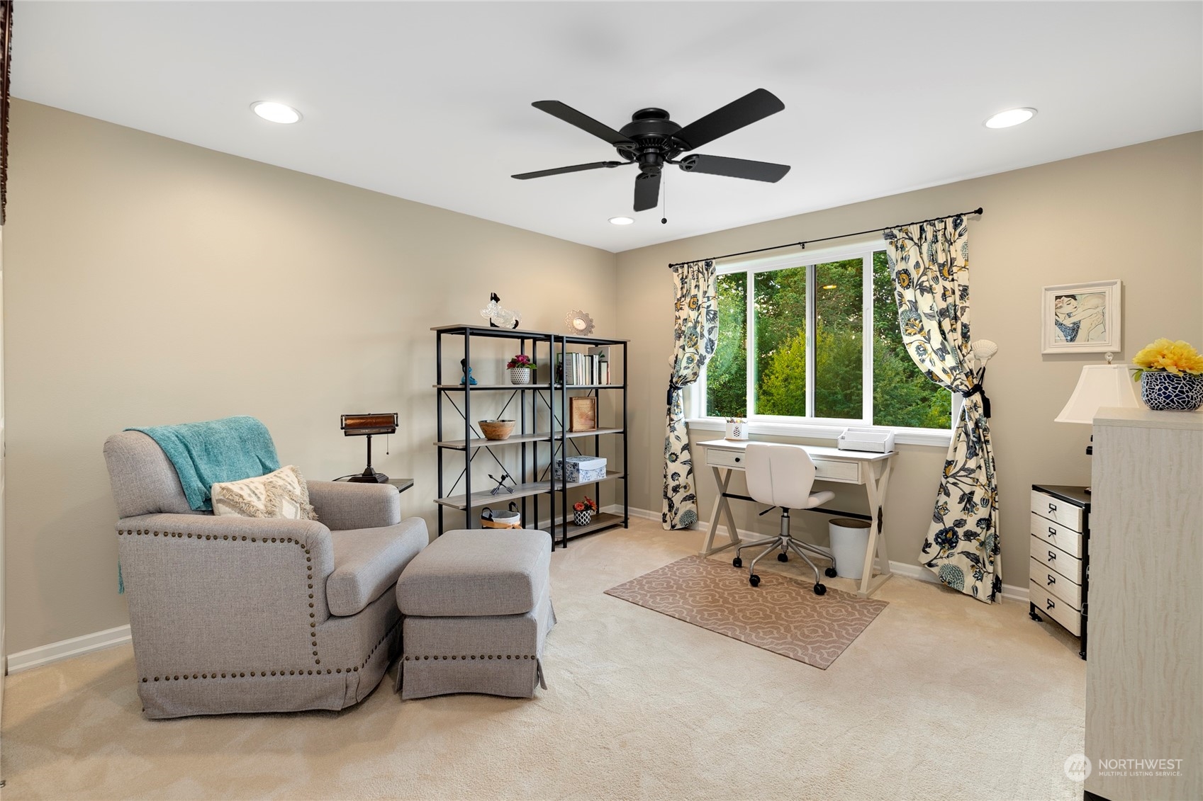 1124 Summit Lake Shore Road Northwest Olympia, WA 98502 - Photo 25 of 40 a living room with furniture and a large window