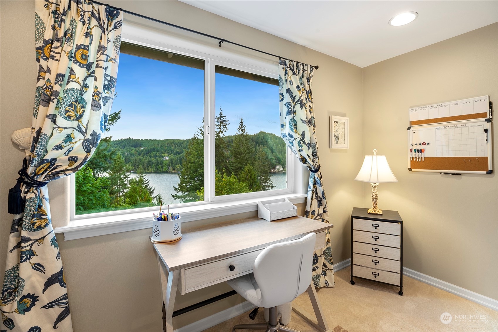 1124 Summit Lake Shore Road Northwest Olympia, WA 98502 - Photo 27 of 40 a view of a room that has a bed and a window