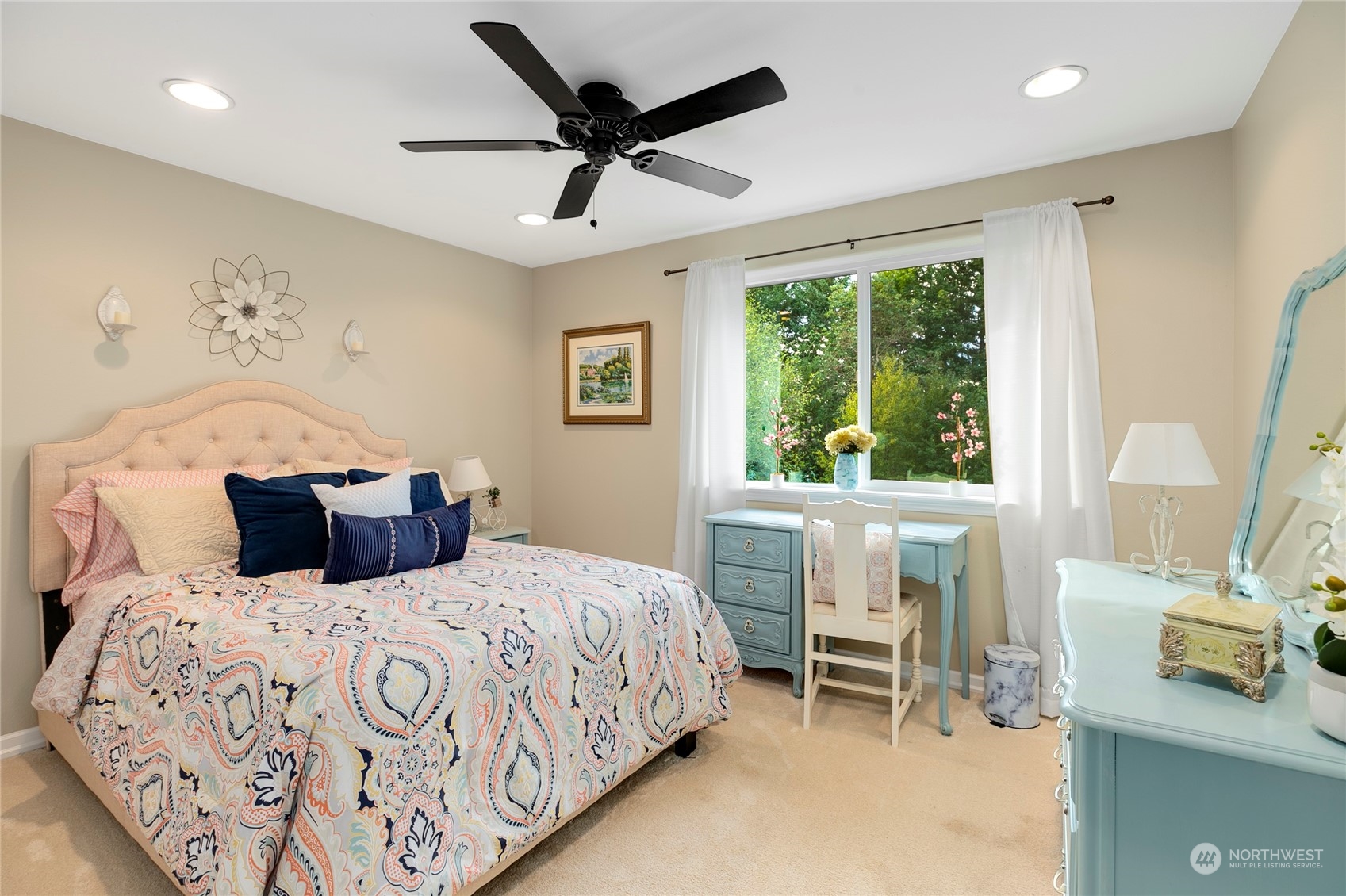 1124 Summit Lake Shore Road Northwest Olympia, WA 98502 - Photo 28 of 40 a bedroom with a large bed and a window