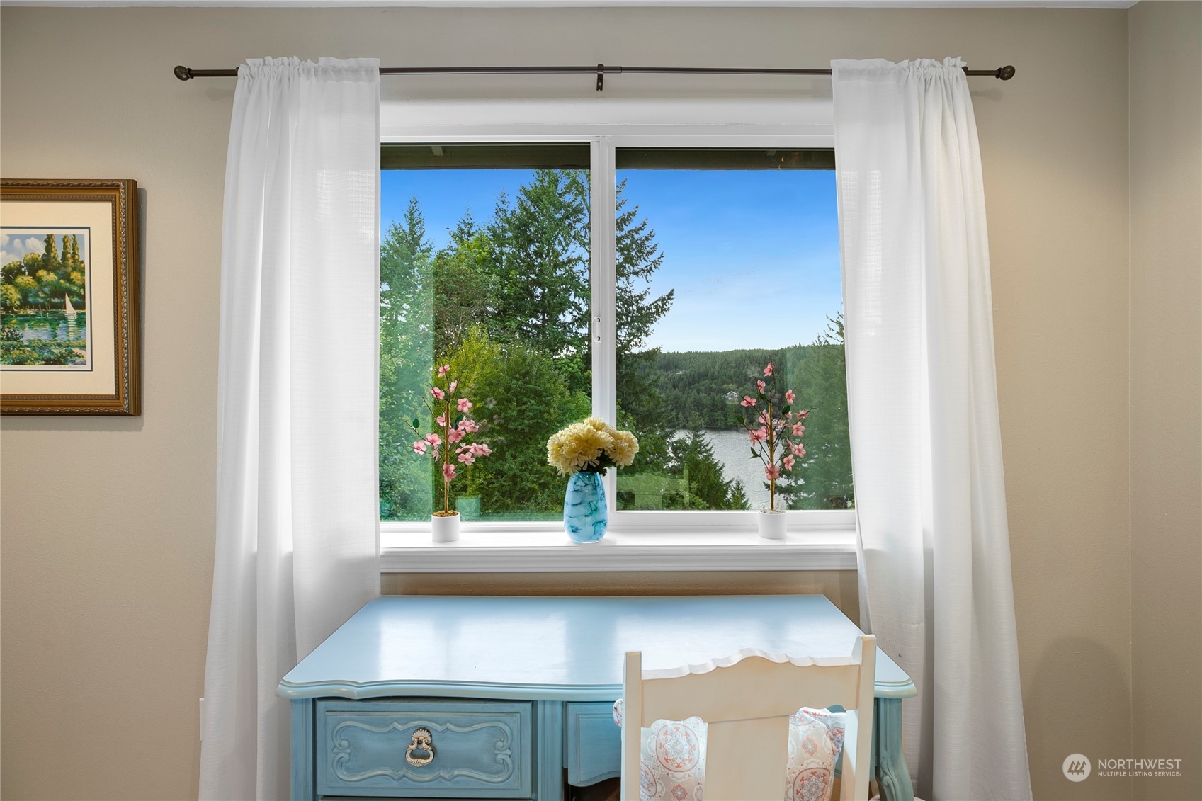 1124 Summit Lake Shore Road Northwest Olympia, WA 98502 - Photo 30 of 40 a bathroom with a sink and a window