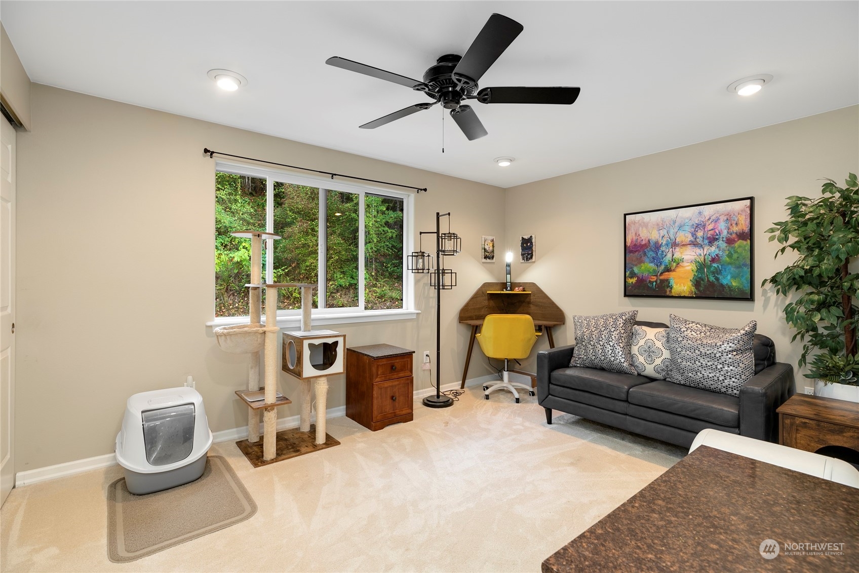 1124 Summit Lake Shore Road Northwest Olympia, WA 98502 - Photo 32 of 40 a living room with furniture and a window
