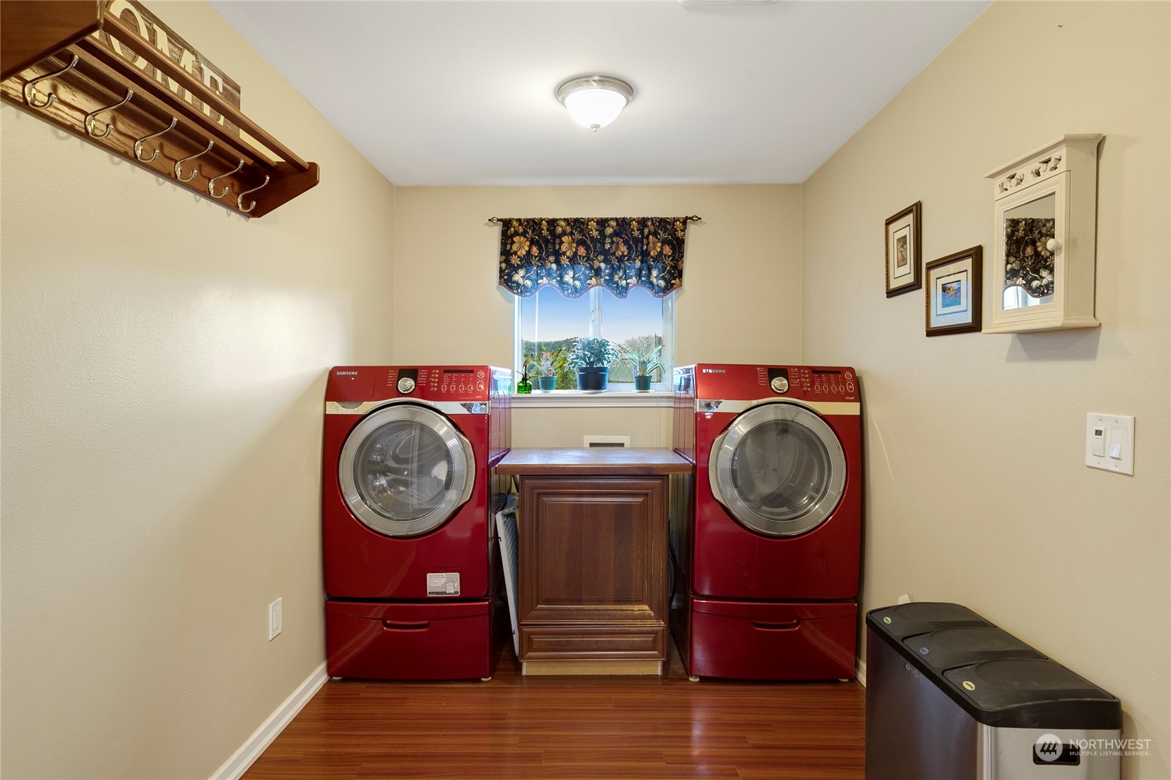 1124 Summit Lake Shore Road Northwest Olympia, WA 98502 - Photo 35 of 40 a view of storage and utility room with washer and dryer