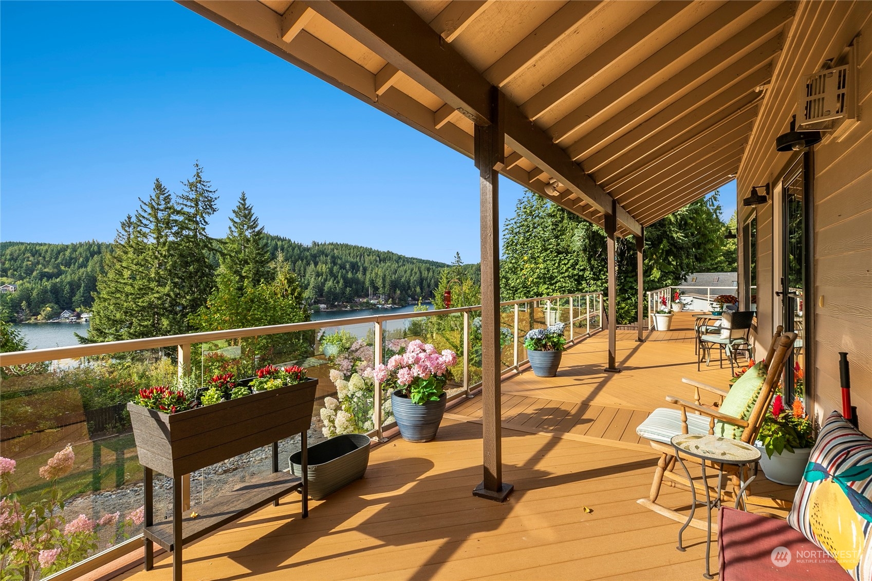 1124 Summit Lake Shore Road Northwest Olympia, WA 98502 - Photo 36 of 40 a view of sitting area with furniture and wooden floor
