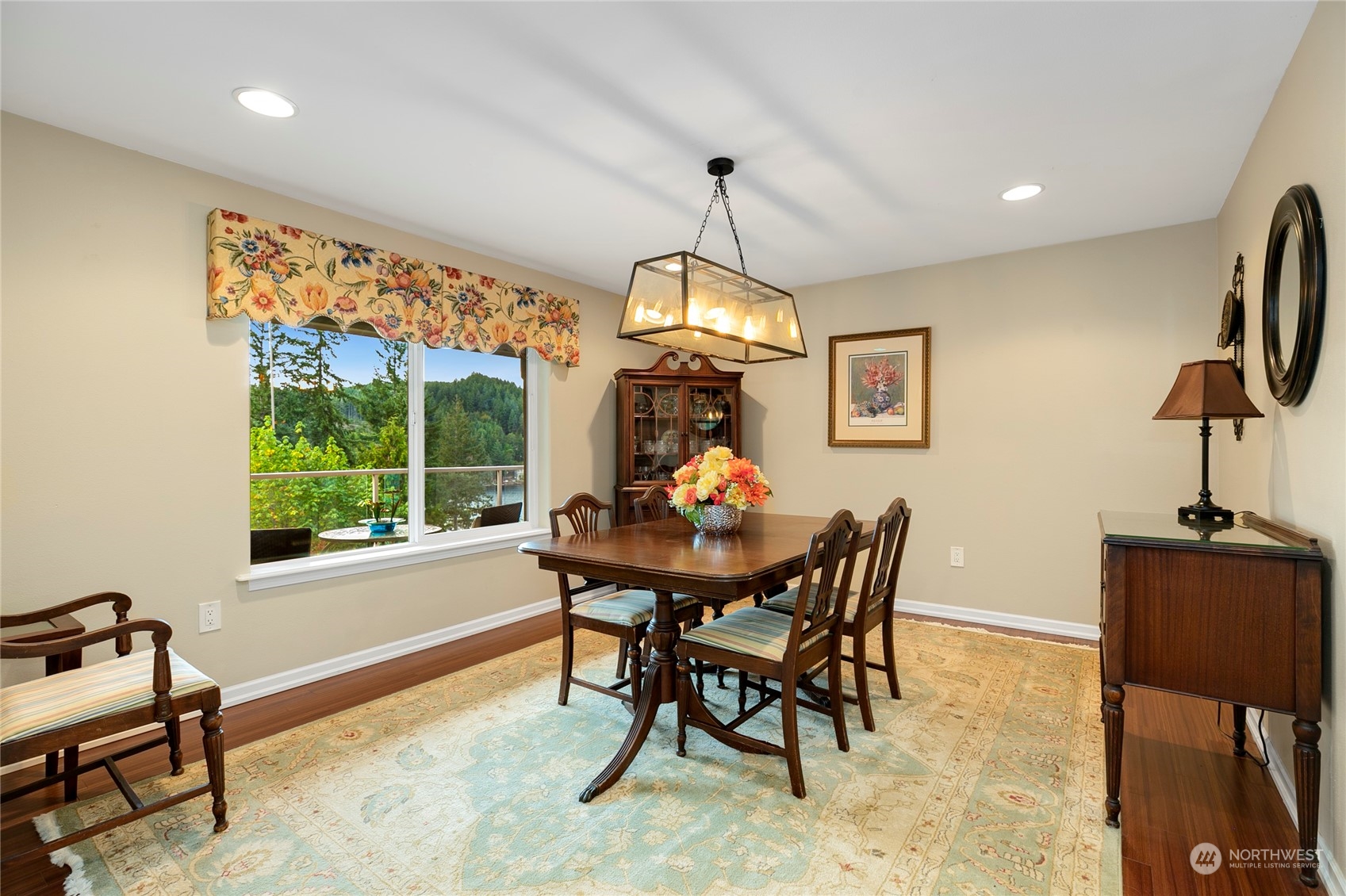 1124 Summit Lake Shore Road Northwest Olympia, WA 98502 - Photo 7 of 40 a view of a dining room with furniture window and outside view