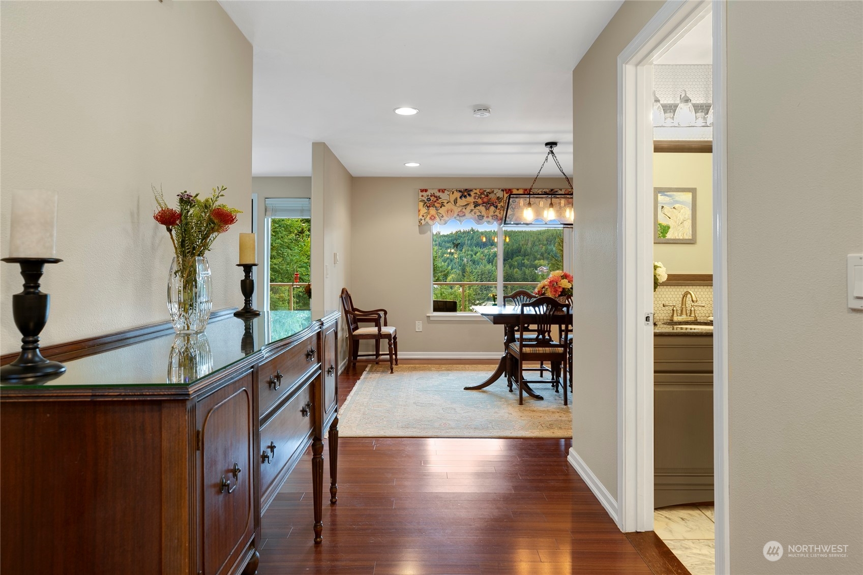 1124 Summit Lake Shore Road Northwest Olympia, WA 98502 - Photo 10 of 40 a living room with furniture and a potted plant
