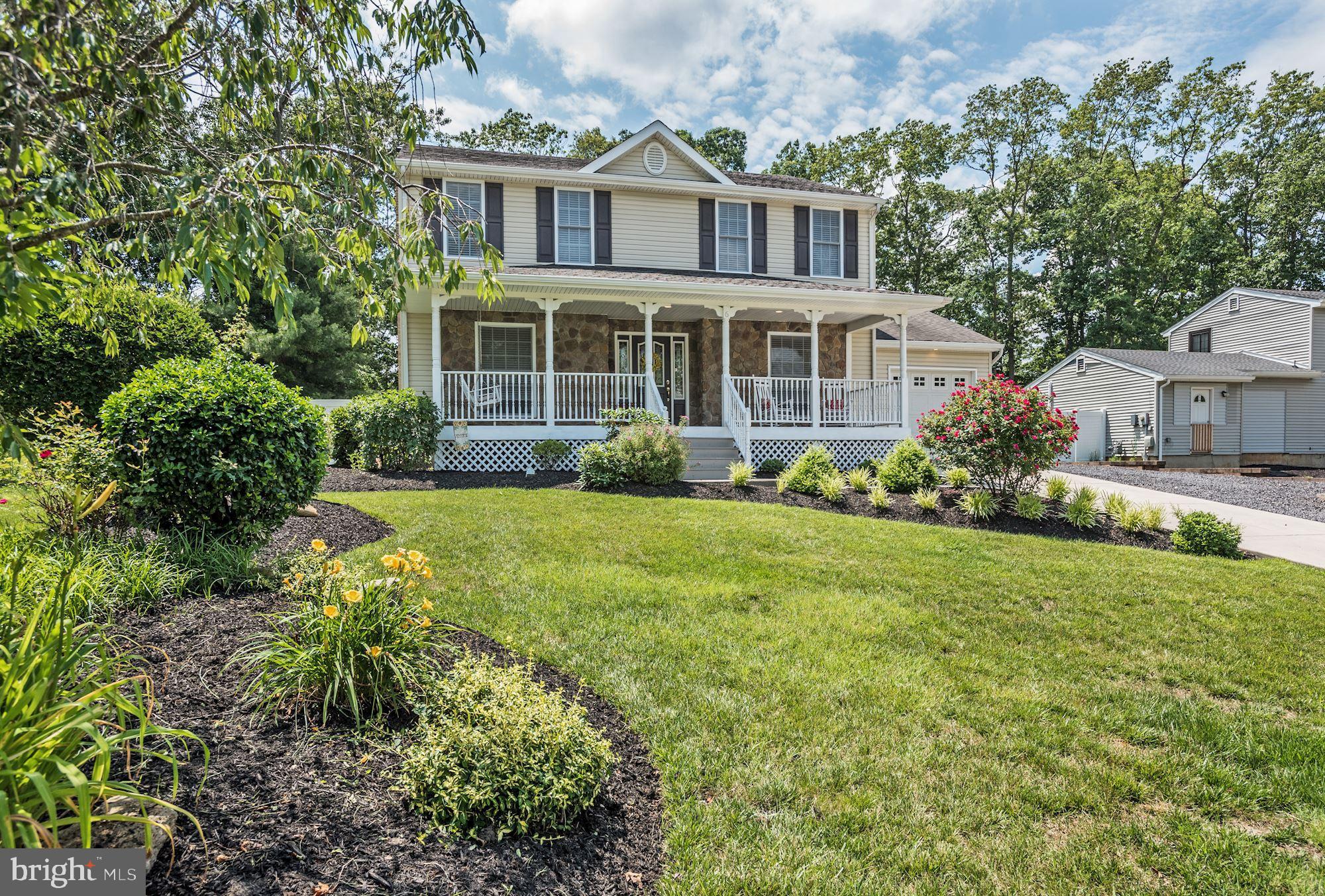 6 Mariner Drive Sewell, NJ 08080 - Photo 3 of 32 a front view of a house with garden