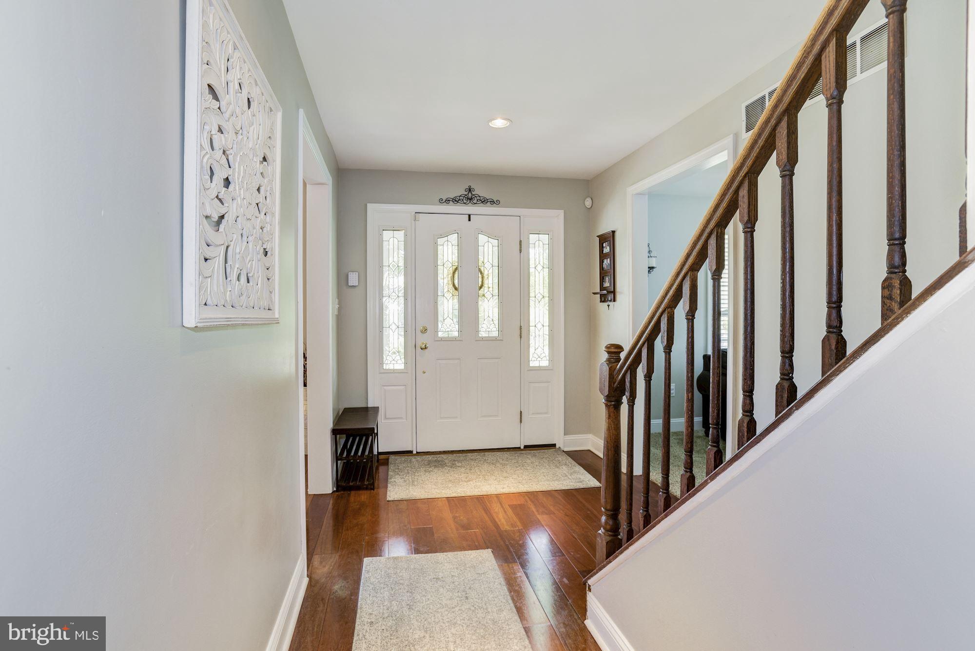 6 Mariner Drive Sewell, NJ 08080 - Photo 6 of 32 a view of a hallway with wooden floor and entryway