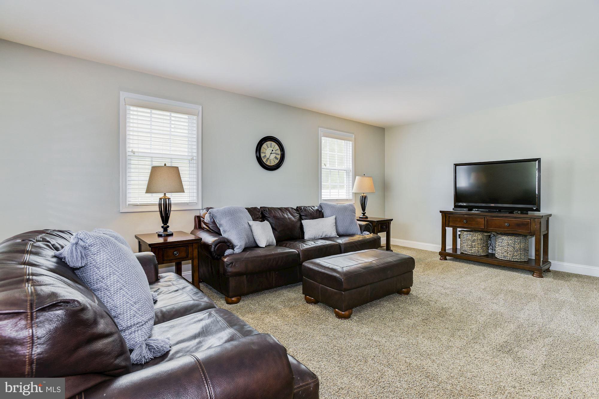 6 Mariner Drive Sewell, NJ 08080 - Photo 7 of 32 a living room with furniture and a flat screen tv