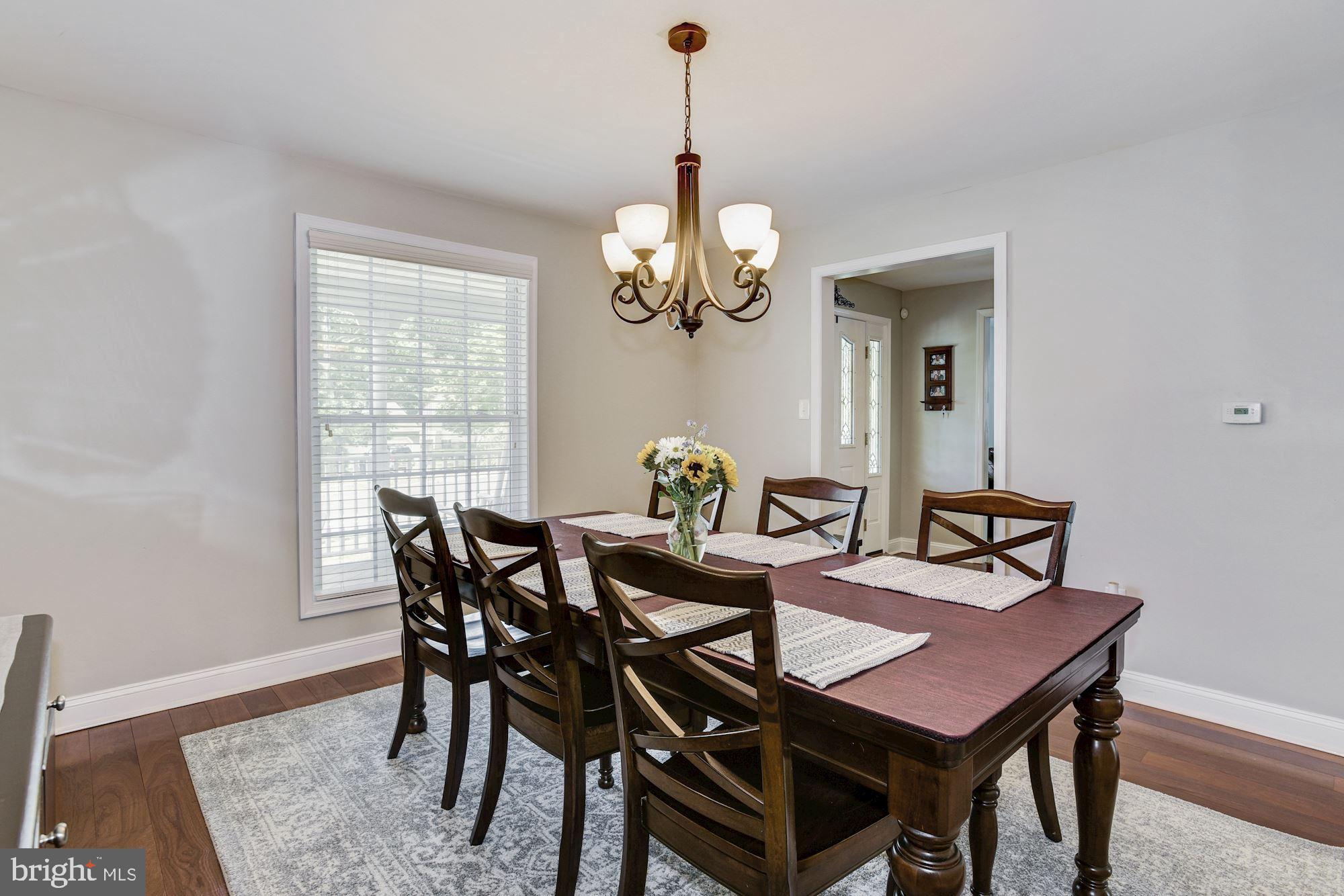 6 Mariner Drive Sewell, NJ 08080 - Photo 10 of 32 a view of a dining room with furniture window and wooden floor