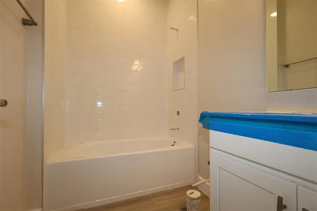 a bathroom with a bathtub