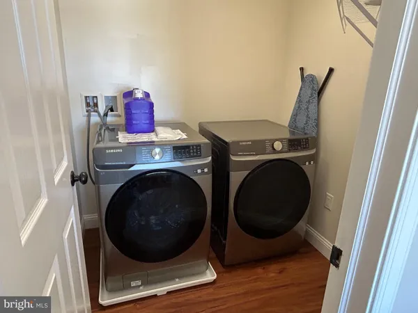 a utility room with dryer and washer