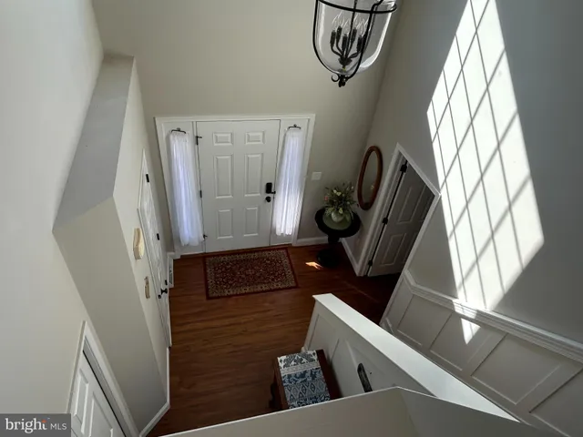 a view of a chairs on wooden deck