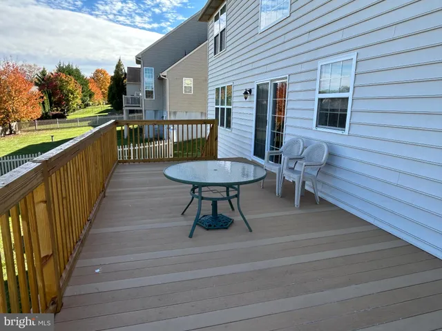 a view of a backyard with a garden and plants