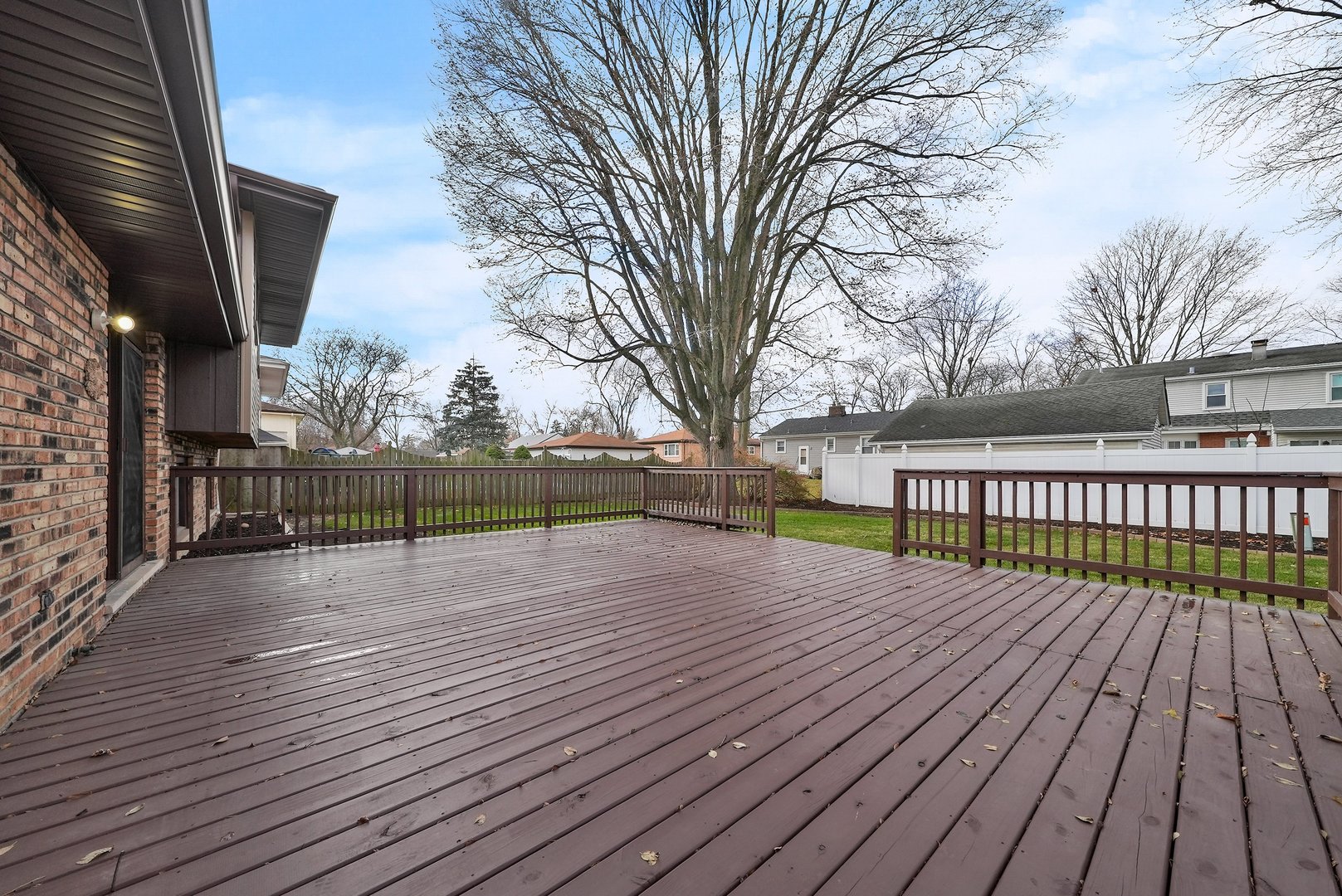 17522 Wright Street Lansing, IL 60438 - Photo 21 of 21 a view of wooden deck with a trees