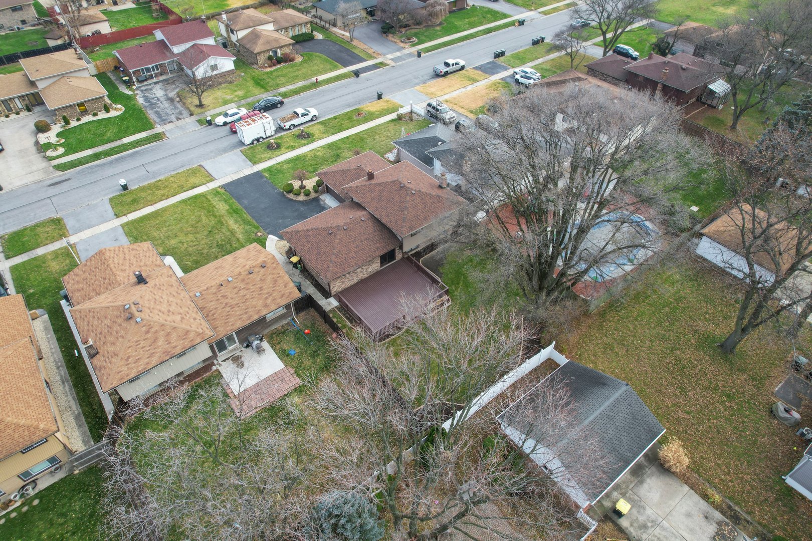 17522 Wright Street Lansing, IL 60438 - Photo 4 of 21 an aerial view of a house with a yard