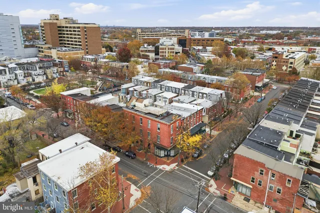 an aerial view of a city with lots of residential buildings
