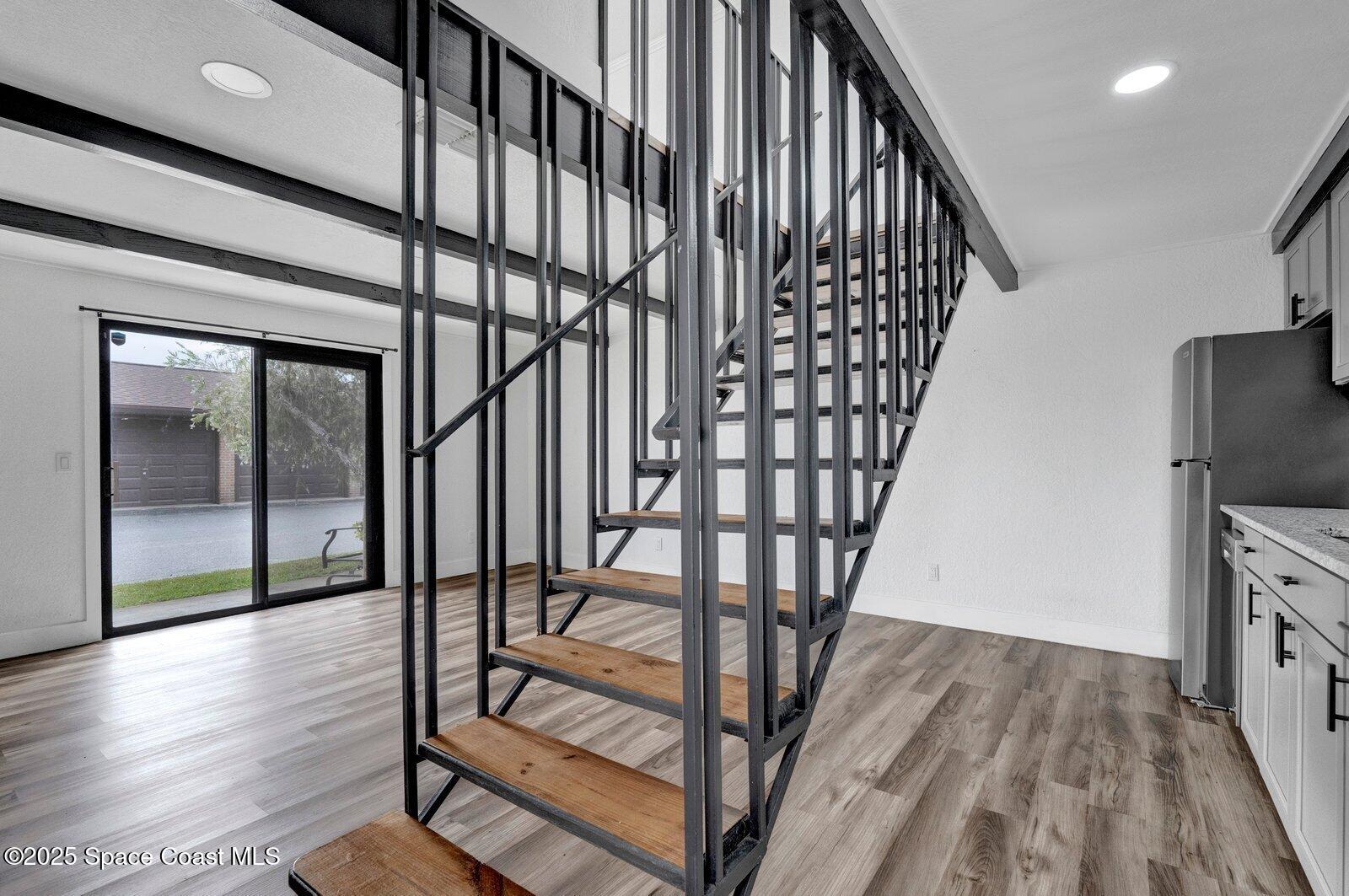 3912 Overlook Drive, Unit 38 Palm Bay, FL 32905 - Photo 12 of 20 a view of entryway with wooden floor