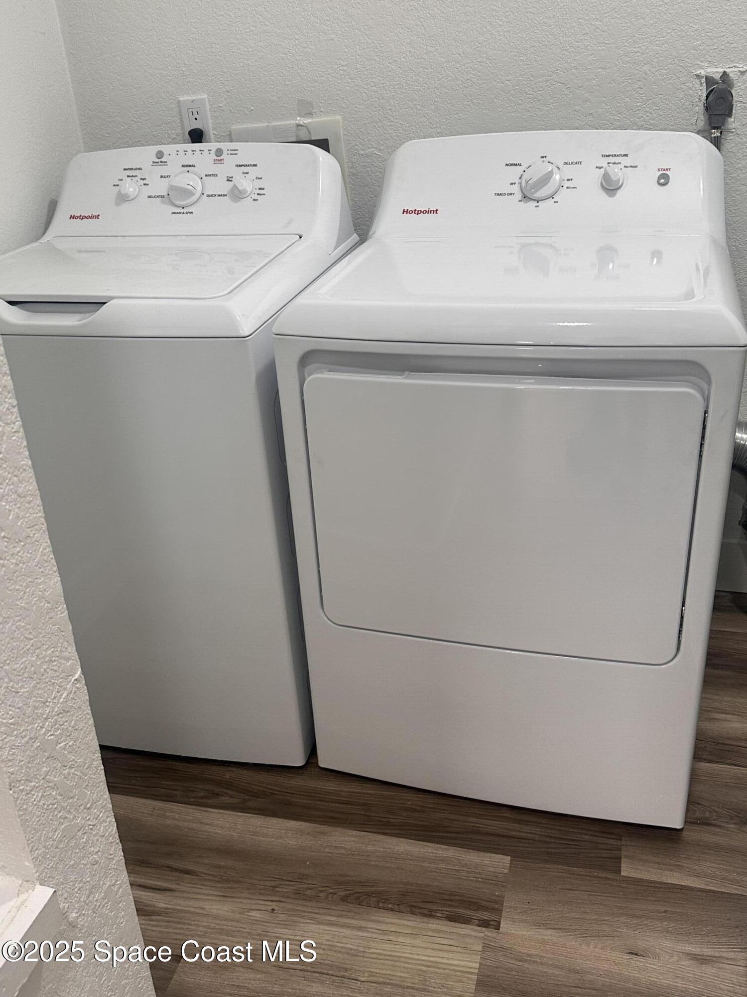 3912 Overlook Drive, Unit 38 Palm Bay, FL 32905 - Photo 17 of 20 a utility room with dryer and washer