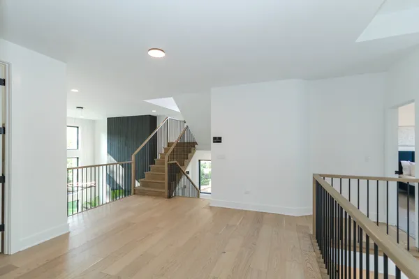 a view of empty room with stairs