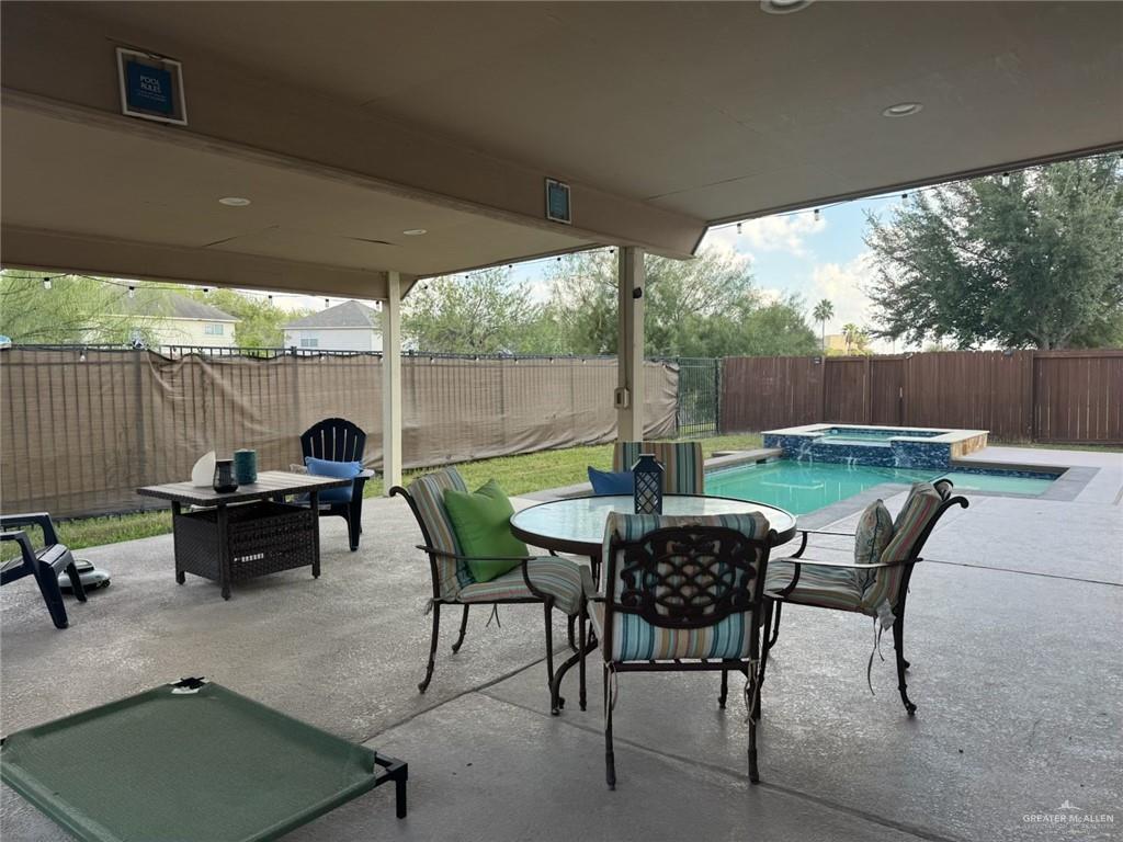 3407 San Angelo Street Mission, TX 78572 - Photo 36 of 40 a view of an outdoor sitting area with furniture and garden