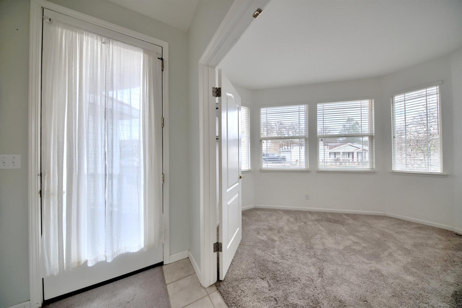 6250 Bluff View Road Copperopolis, CA 95228 - Photo 17 of 76 a view of an empty room with a window