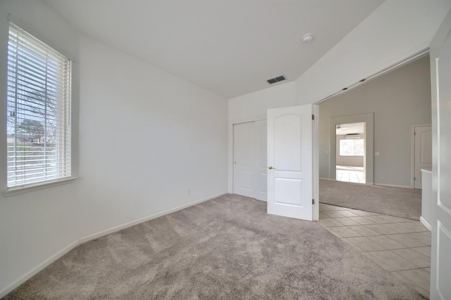 6250 Bluff View Road Copperopolis, CA 95228 - Photo 25 of 76 a view of an empty room with a window