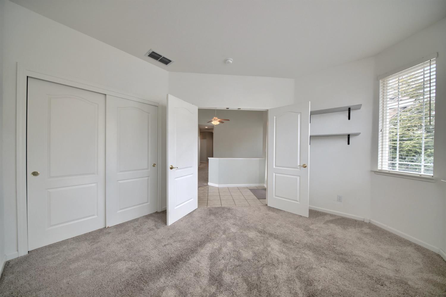 6250 Bluff View Road Copperopolis, CA 95228 - Photo 26 of 76 a view of an empty room with a window