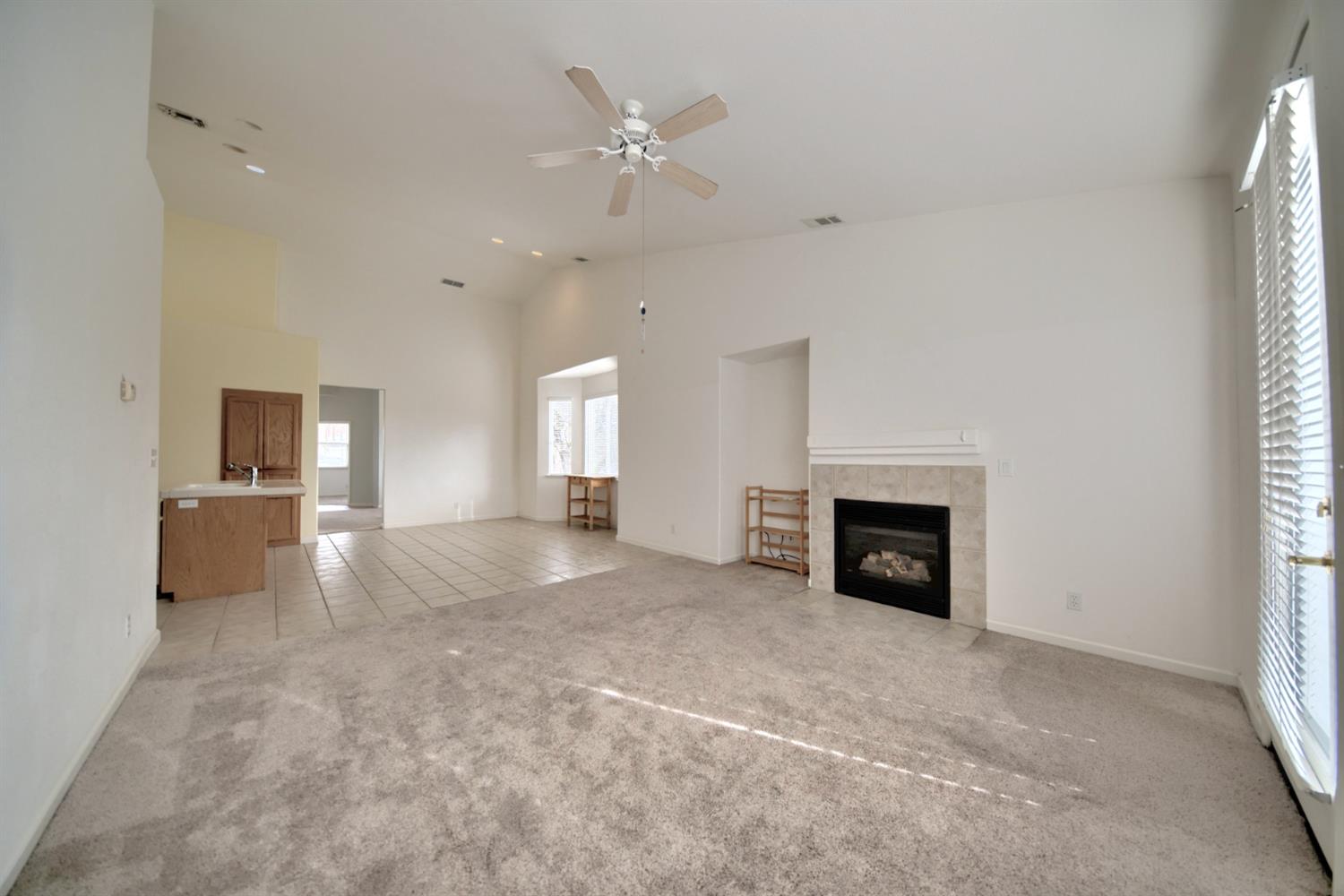 6250 Bluff View Road Copperopolis, CA 95228 - Photo 30 of 76 a view of a livingroom with a fireplace and window