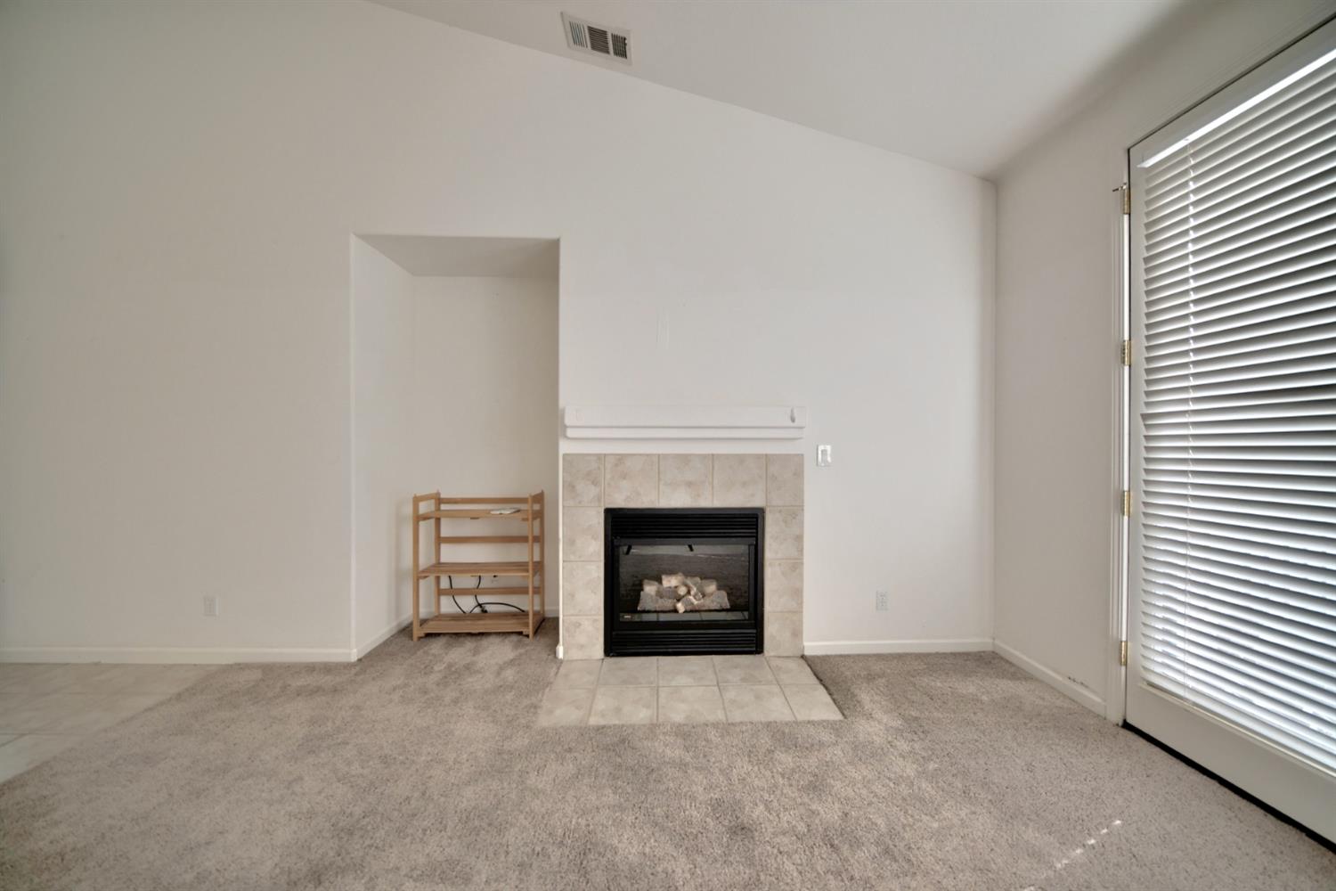 6250 Bluff View Road Copperopolis, CA 95228 - Photo 31 of 76 a room with a fireplace