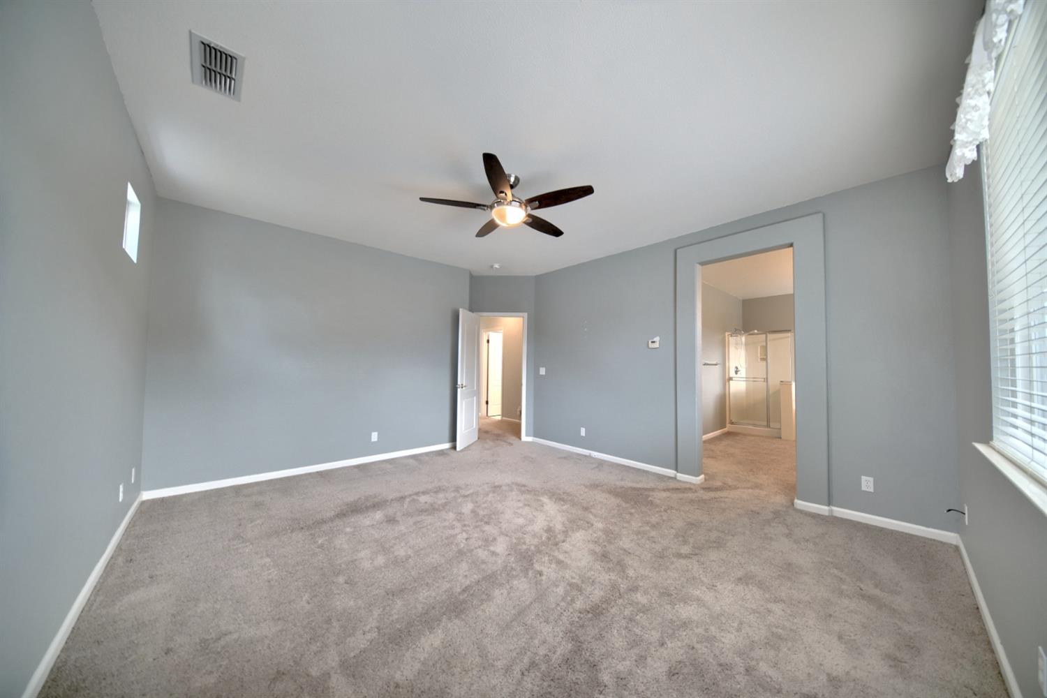 6250 Bluff View Road Copperopolis, CA 95228 - Photo 52 of 76 a view of a livingroom with a ceiling fan and window