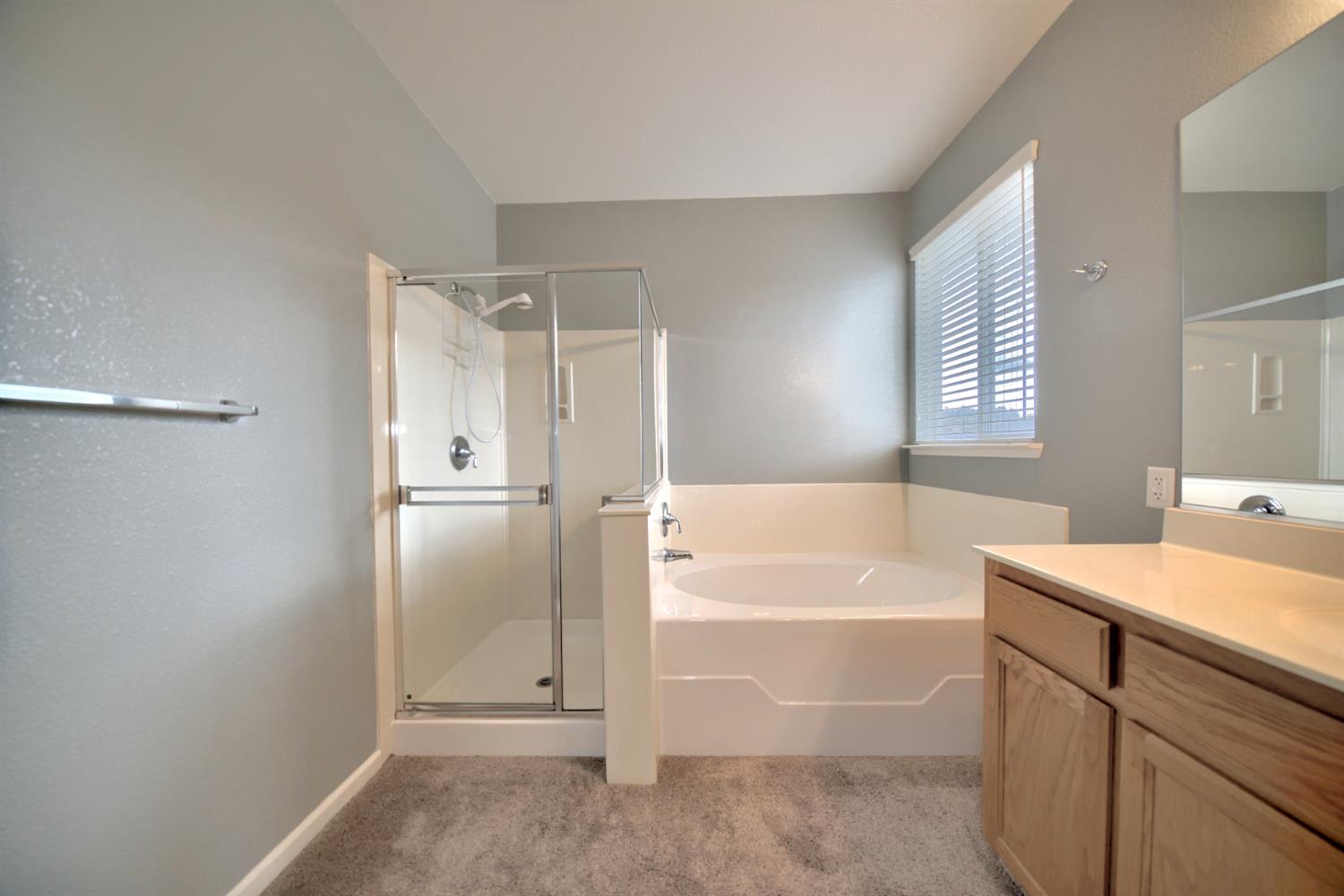 6250 Bluff View Road Copperopolis, CA 95228 - Photo 55 of 76 a bathroom with a tub shower sink and mirror