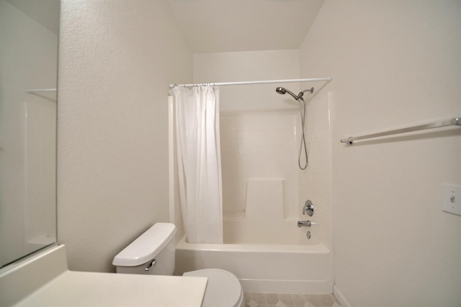 6250 Bluff View Road Copperopolis, CA 95228 - Photo 58 of 76 a bathroom with a toilet and a shower