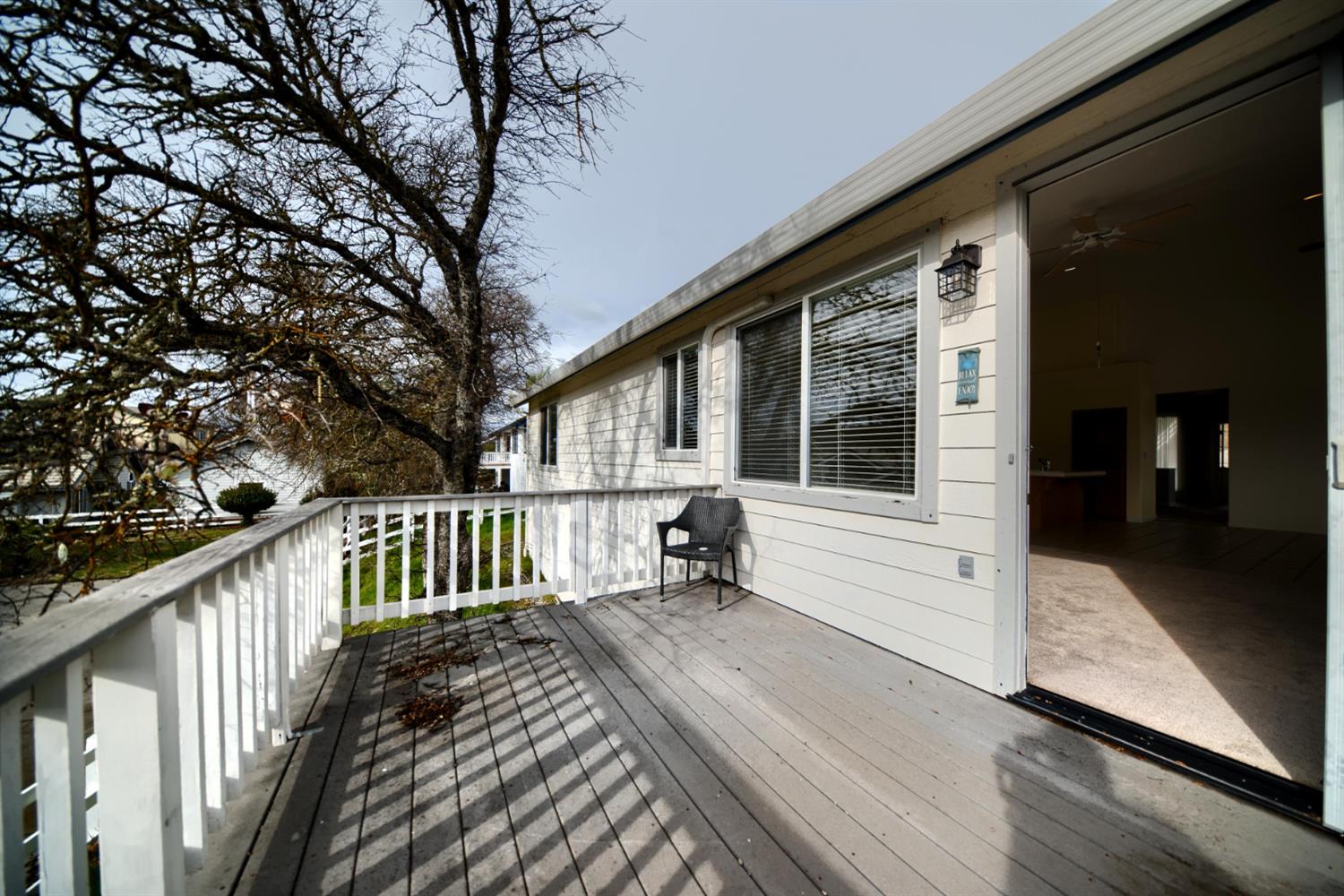 6250 Bluff View Road Copperopolis, CA 95228 - Photo 62 of 76 a view of a house with wooden deck and furniture