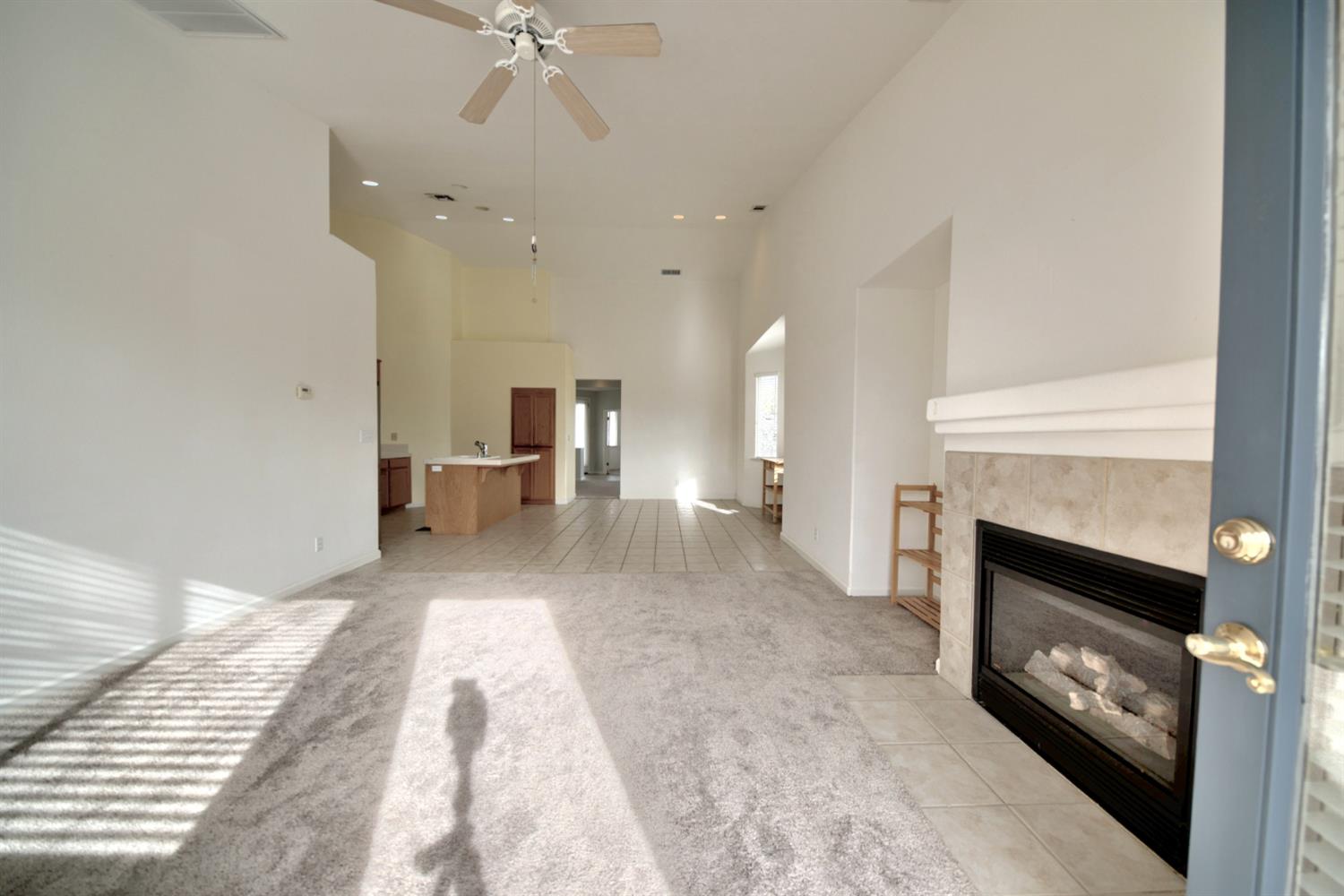6250 Bluff View Road Copperopolis, CA 95228 - Photo 10 of 76 a view of a room with workspace and a fireplace