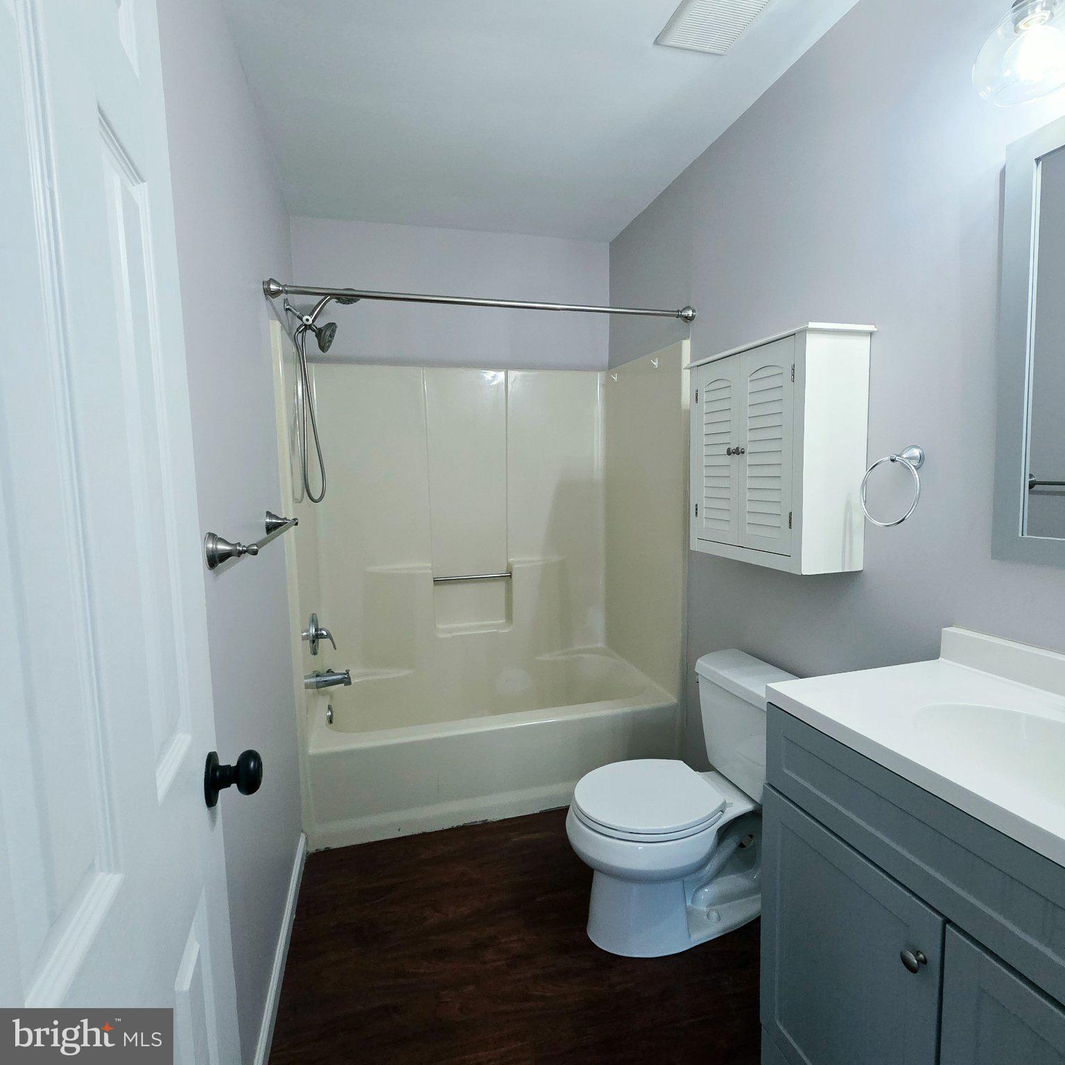 208 Ashley Run Voorhees, NJ 08043 - Photo 19 of 23 a bathroom with a toilet a sink and a shower