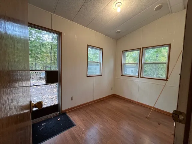 a view of an empty room and window