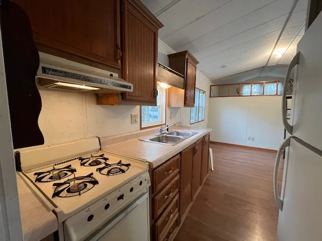 a bedroom with a bed and a mirror