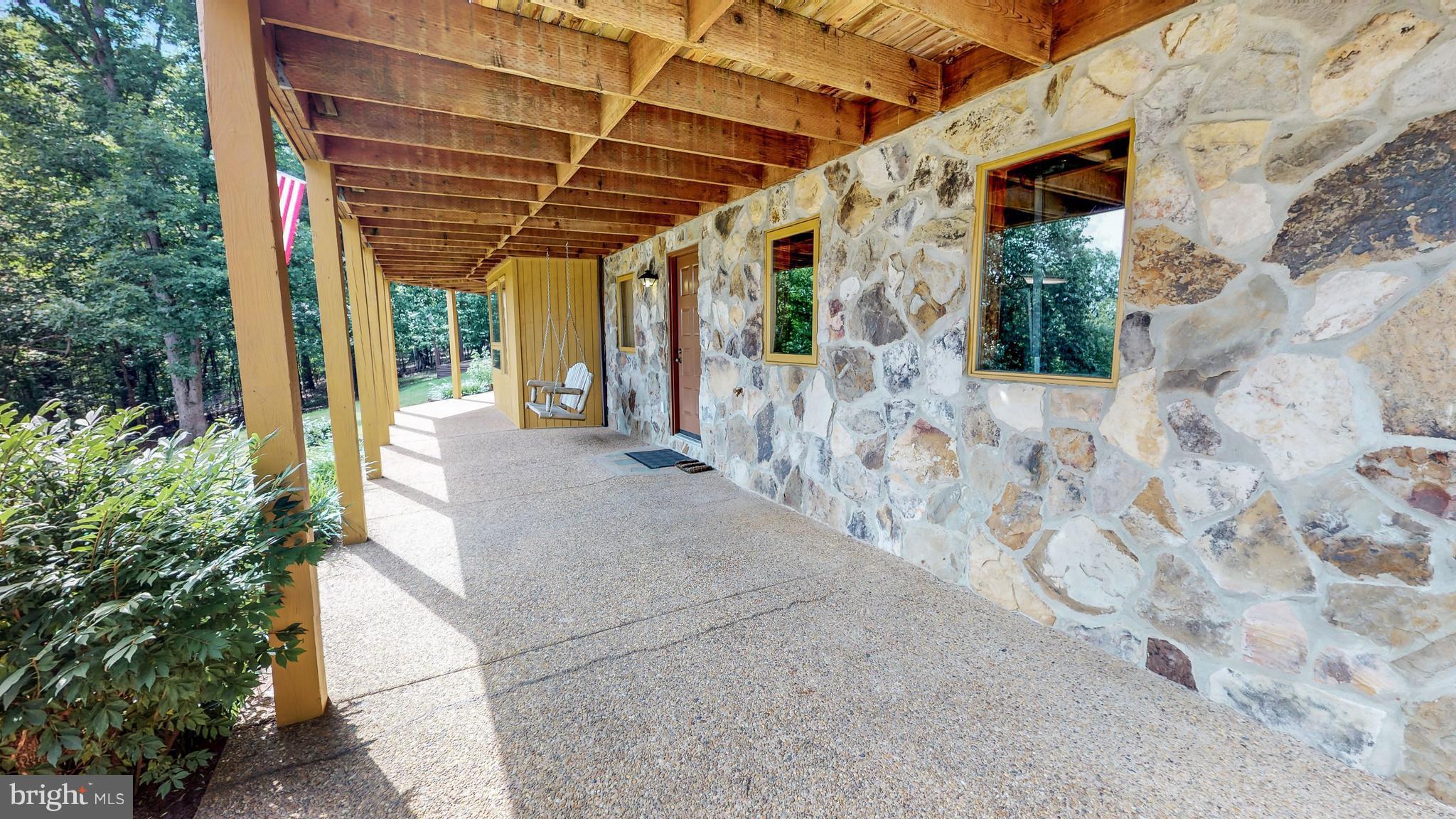 51 Thunder Road Front Royal, VA 22630 - Photo 16 of 28 Patio area under deck and more stonework