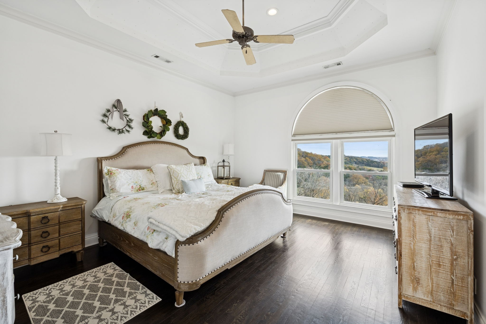 2194 South Berrys Chapel Road Franklin, TN 37069 - Photo 18 of 41 a bedroom with a bed a large window and wooden floor