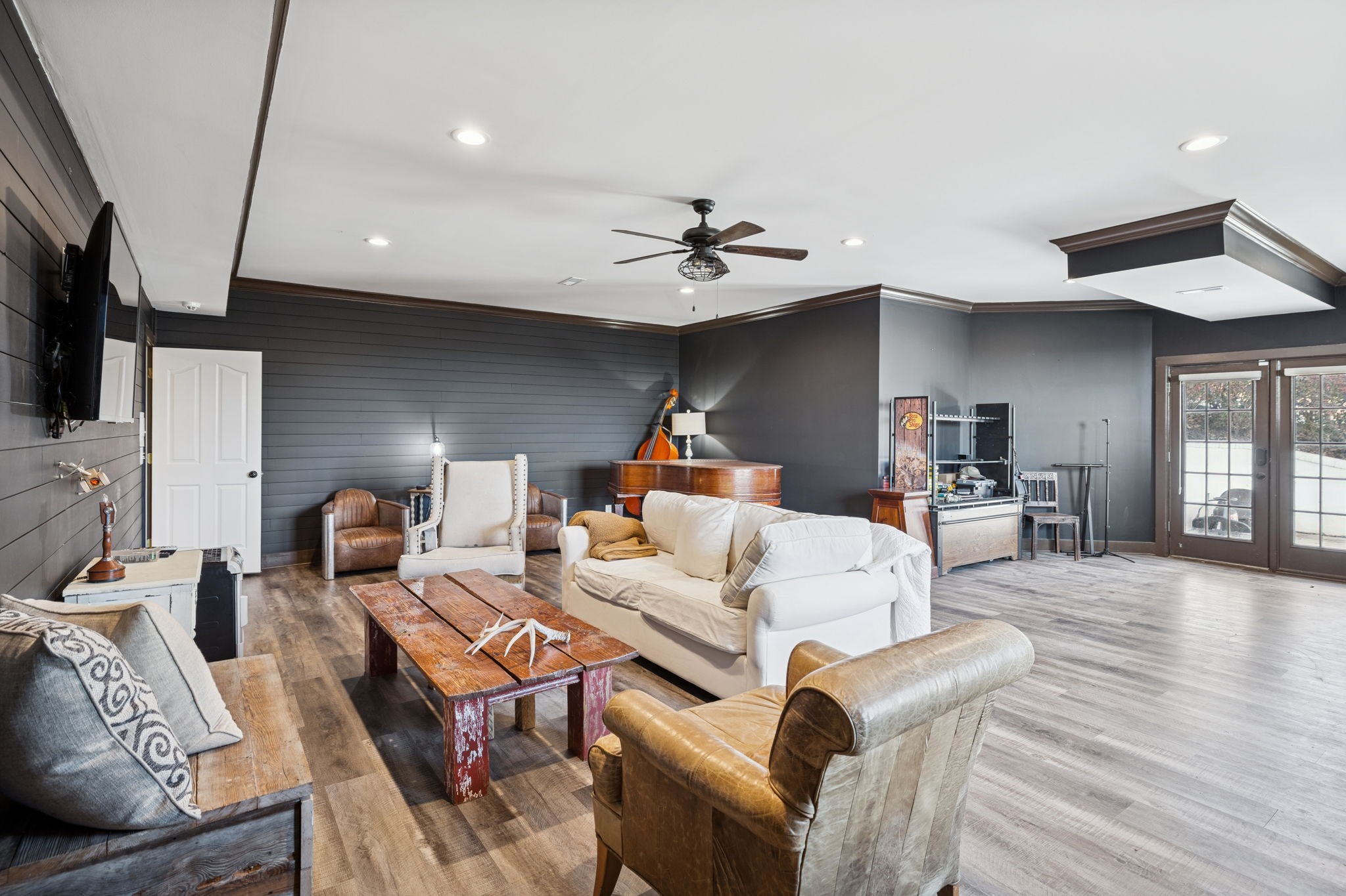 2194 South Berrys Chapel Road Franklin, TN 37069 - Photo 27 of 41 a living room with furniture a fireplace and a flat screen tv