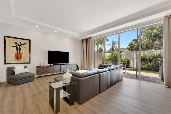 a view of a livingroom with furniture and stairs