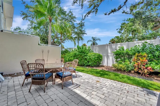 a view of a hallway with wooden floor and entryway
