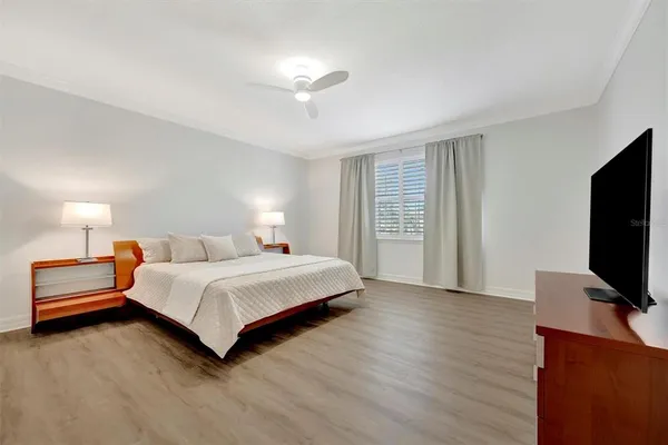 a bathroom with a toilet and shower