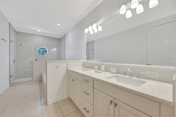 a bedroom with a bed and a desk